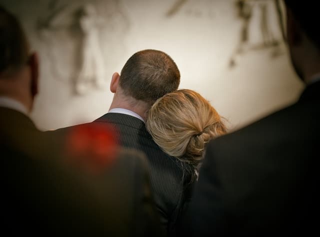 two people in grief